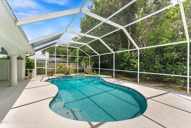 174 Martesia Way, Indian Harbour Beach, FL 32937 - swimming pool featuring a fenced backyard, a patio area, and a lanai