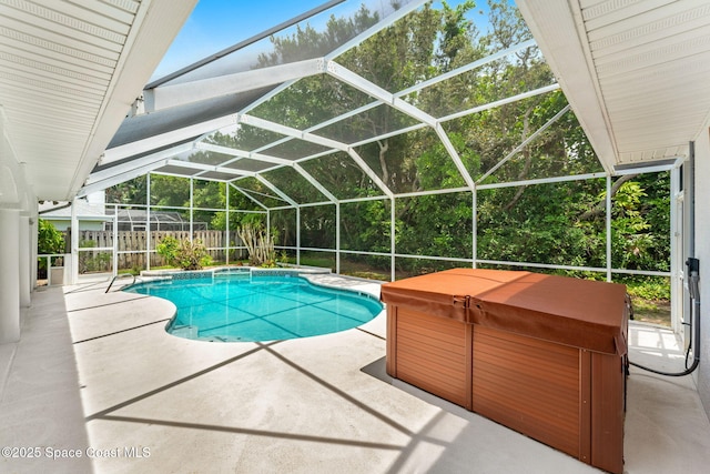174 Martesia Way, Indian Harbour Beach, FL 32937 - view of pool with a hot tub, a patio, a fenced backyard, and a lanai