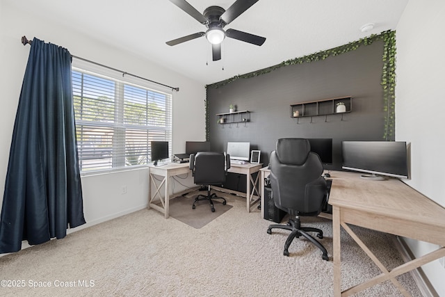 5071 Talbot Blvd, Cocoa, FL 32926 - carpeted home office with baseboards and a ceiling fan