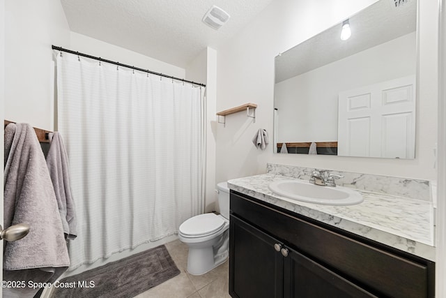 5071 Talbot Blvd, Cocoa, FL 32926 - full bath with vanity, tile patterned flooring, and a textured ceiling