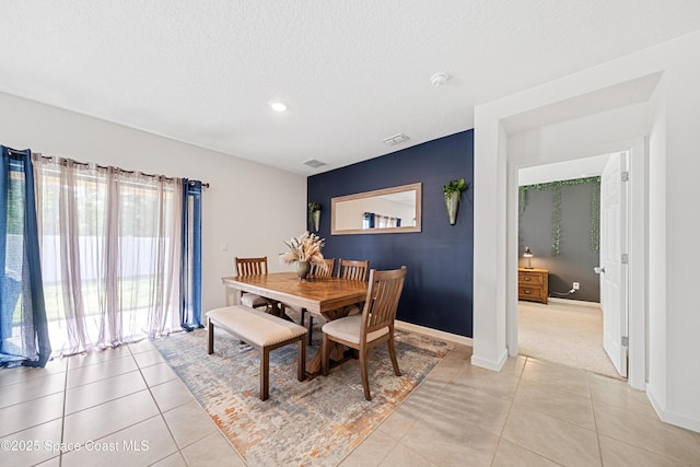5071 Talbot Blvd, Cocoa, FL 32926 - dining area featuring light tile patterned floors, a textured ceiling, and recessed lighting