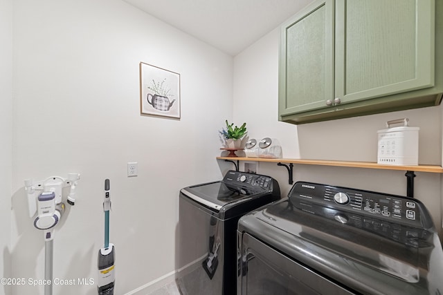 5071 Talbot Blvd, Cocoa, FL 32926 - laundry area featuring washing machine and dryer and cabinet space