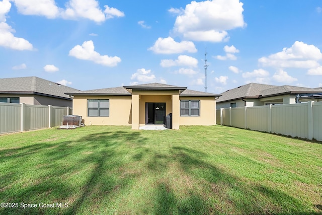 5071 Talbot Blvd, Cocoa, FL 32926 - rear view of property featuring stucco siding and a fenced backyard