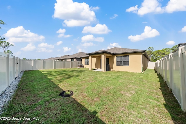 5071 Talbot Blvd, Cocoa, FL 32926 - rear view of house featuring stucco siding and a fenced backyard