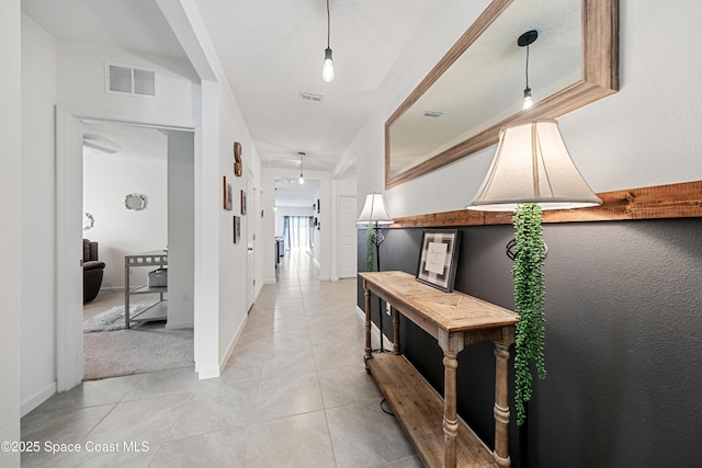 5071 Talbot Blvd, Cocoa, FL 32926 - hall with light tile patterned floors and baseboards