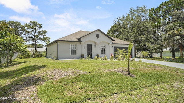 160 Eureka Ave NE, Palm Bay, FL 32907 - ranch-style home with a garage, driveway, and a front lawn