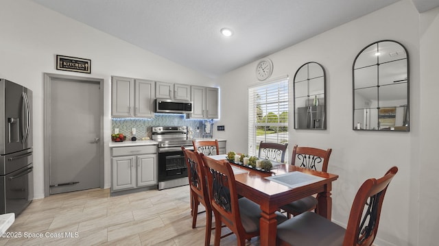 160 Eureka Ave NE, Palm Bay, FL 32907 - dining space with lofted ceiling