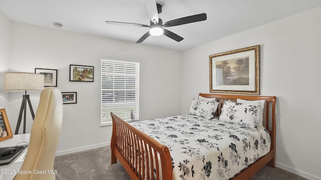 160 Eureka Ave NE, Palm Bay, FL 32907 - carpeted bedroom with baseboards and a ceiling fan