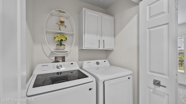 160 Eureka Ave NE, Palm Bay, FL 32907 - laundry room with cabinet space and washer and dryer
