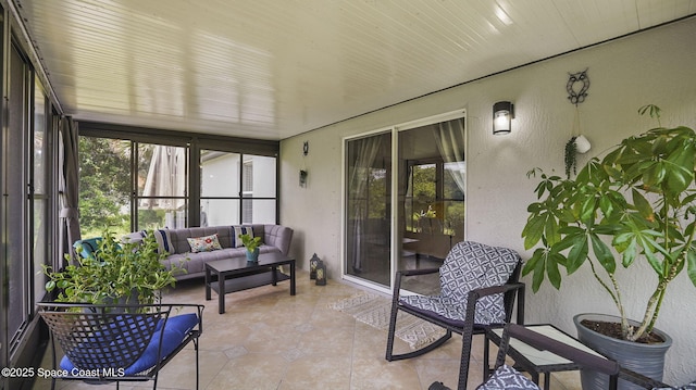 160 Eureka Ave NE, Palm Bay, FL 32907 - sunroom featuring an outdoor hangout area