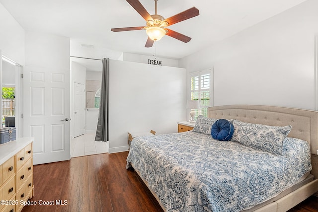 1014 Pelican Ln, Rockledge, FL 32955 - bedroom featuring dark wood finished floors and ceiling fan