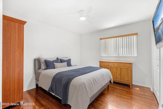 1014 Pelican Ln, Rockledge, FL 32955 - bedroom with wood-type flooring and a ceiling fan