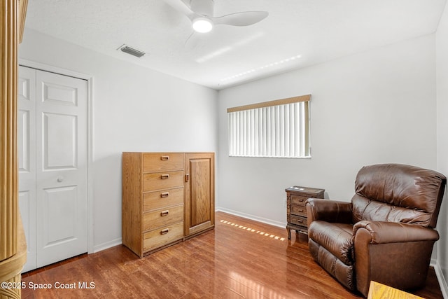1014 Pelican Ln, Rockledge, FL 32955 - living area featuring wood finished floors and ceiling fan