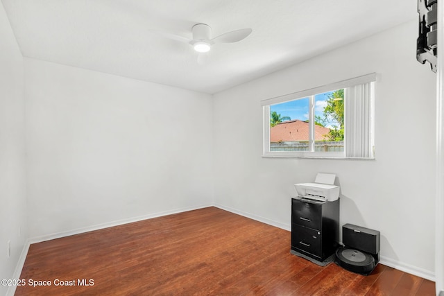 1014 Pelican Ln, Rockledge, FL 32955 - spare room with ceiling fan and dark wood-type flooring