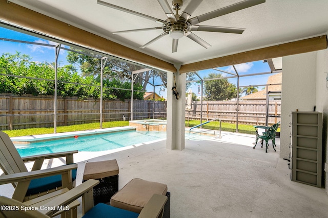 1014 Pelican Ln, Rockledge, FL 32955 - view of pool featuring a fenced backyard, a ceiling fan, a patio, a lanai, and a pool with connected hot tub
