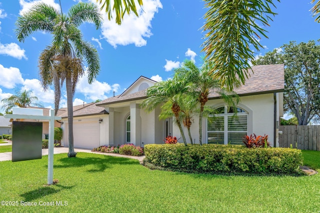 1014 Pelican Ln, Rockledge, FL 32955 - ranch-style house with a garage and stucco siding
