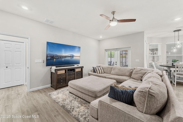 3550 Salt Marsh Cir, West Melbourne, FL 32904 - living room featuring ceiling fan, light wood-style flooring, and recessed lighting