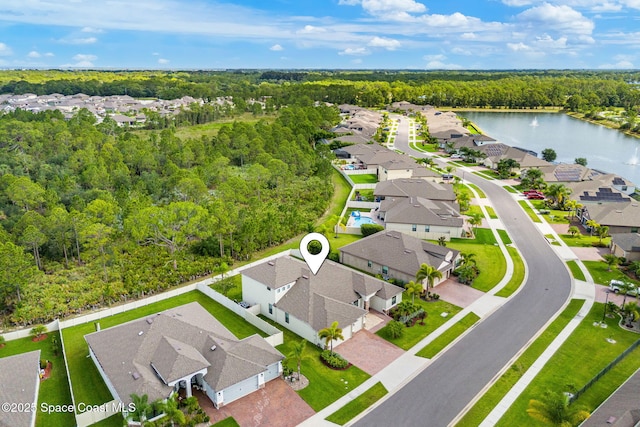 3550 Salt Marsh Cir, West Melbourne, FL 32904 - aerial view of residential area featuring a nearby body of water and a heavily wooded area