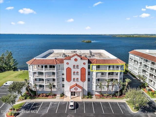 8954 Puerto Del Rio Dr Unit 1503, Cape Canaveral, FL 32920 - aerial view of a large body of water and apartment complex