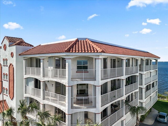 8954 Puerto Del Rio Dr Unit 1503, Cape Canaveral, FL 32920 - view of apartment building / complex featuring a water view