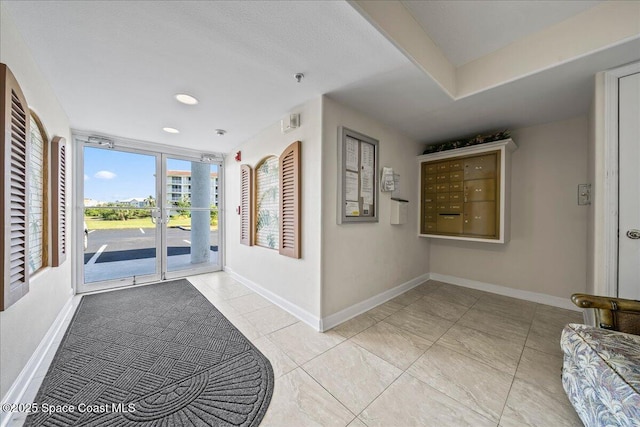 8954 Puerto Del Rio Dr Unit 1503, Cape Canaveral, FL 32920 - foyer with baseboards