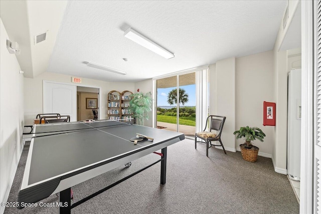 8954 Puerto Del Rio Dr Unit 1503, Cape Canaveral, FL 32920 - game room featuring carpet and a textured ceiling