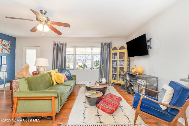 406 Mcleod Dr, Cocoa, FL 32922 - living room featuring wood finished floors and a ceiling fan