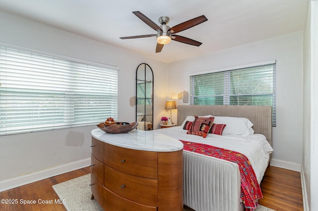 406 Mcleod Dr, Cocoa, FL 32922 - bedroom with wood finished floors and a ceiling fan
