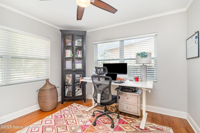 406 Mcleod Dr, Cocoa, FL 32922 - office area with ceiling fan, ornamental molding, and wood finished floors