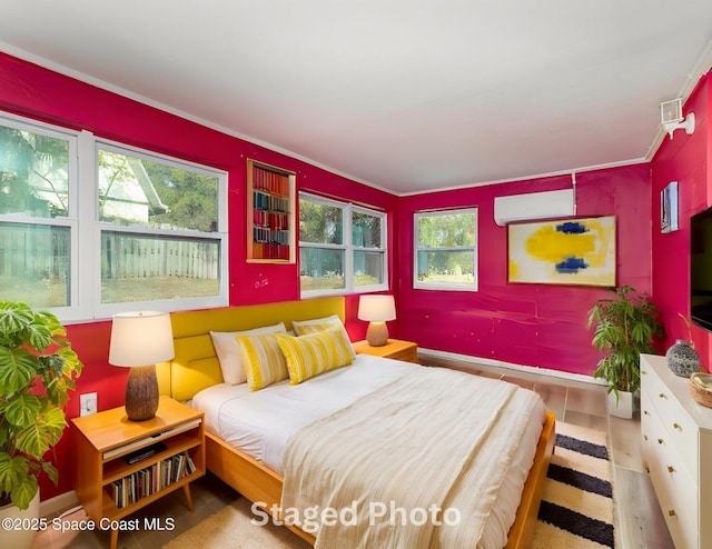 406 Mcleod Dr, Cocoa, FL 32922 - bedroom featuring a wall mounted AC and crown molding