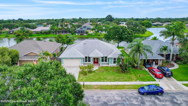 2542 Woodfield Cir, Melbourne, FL 32904 - aerial perspective of suburban area with a large body of water