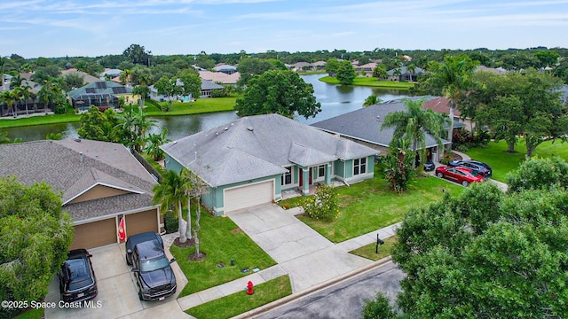 2542 Woodfield Cir, Melbourne, FL 32904 - aerial perspective of suburban area featuring a large body of water