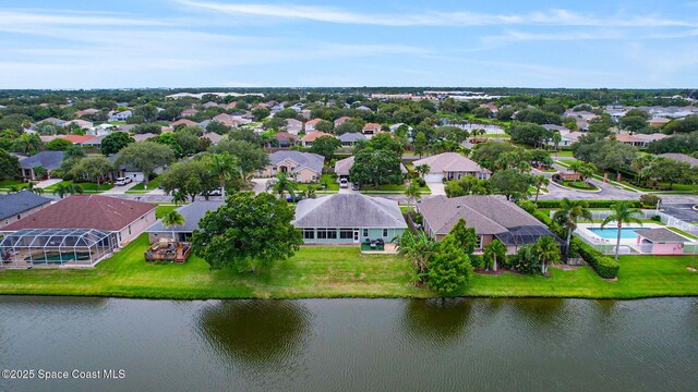 2542 Woodfield Cir, Melbourne, FL 32904 - aerial view of residential area featuring a large body of water