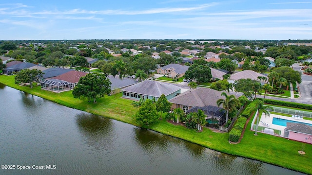 2542 Woodfield Cir, Melbourne, FL 32904 - aerial view of residential area with a nearby body of water and a pool area