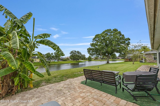 2542 Woodfield Cir, Melbourne, FL 32904 - view of patio featuring a water view and an outdoor hangout area