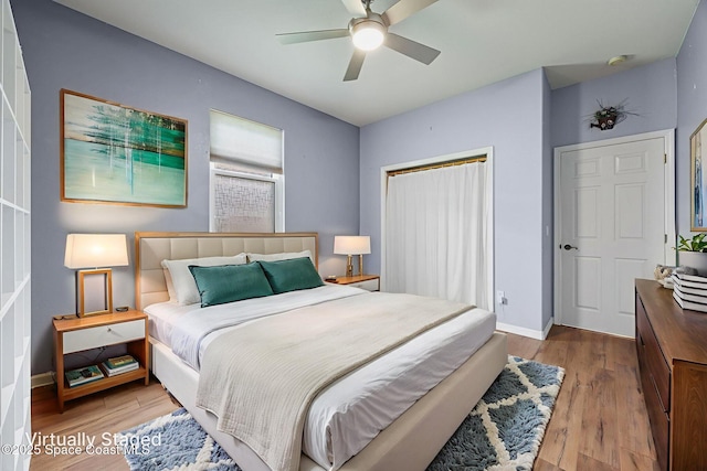 2542 Woodfield Cir, Melbourne, FL 32904 - bedroom featuring a closet, wood finished floors, and ceiling fan