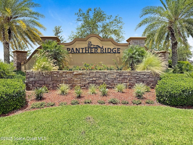 6586 Split Rail Ln, Cocoa, FL 32927 - community sign with a yard