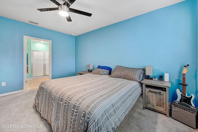 6586 Split Rail Ln, Cocoa, FL 32927 - bedroom with light colored carpet, ceiling fan, and ensuite bath