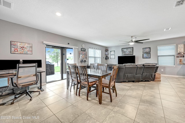 6586 Split Rail Ln, Cocoa, FL 32927 - dining area with a ceiling fan, light tile patterned flooring, an office area, and a textured ceiling