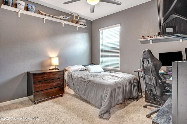 6586 Split Rail Ln, Cocoa, FL 32927 - carpeted bedroom with an office area and ceiling fan