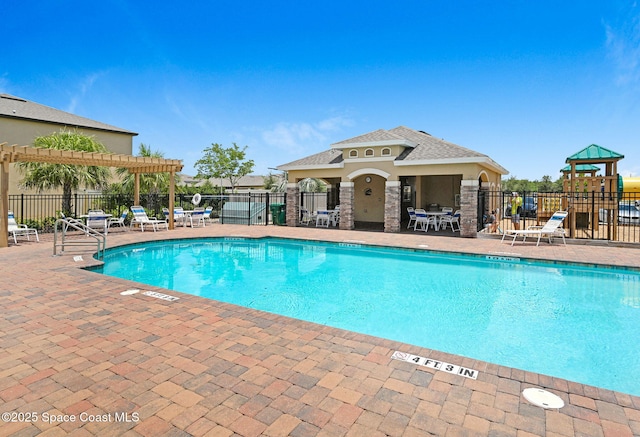 6586 Split Rail Ln, Cocoa, FL 32927 - community pool with a pergola and a patio area