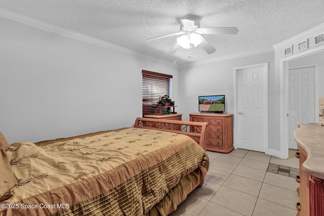 5505 95th St, Sebastian, FL 32958 - bedroom with a textured ceiling, ornamental molding, light tile patterned floors, and ceiling fan