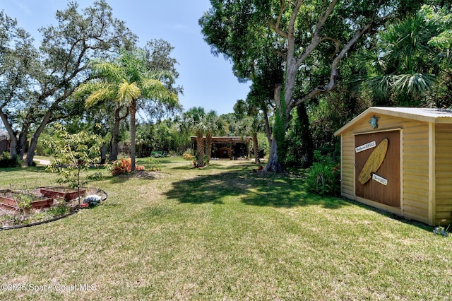 5505 95th St, Sebastian, FL 32958 - view of green lawn featuring a shed