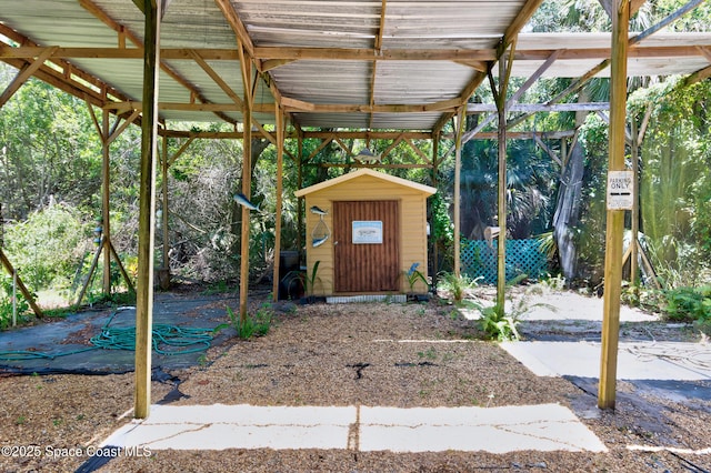 5505 95th St, Sebastian, FL 32958 - view of patio with a storage shed