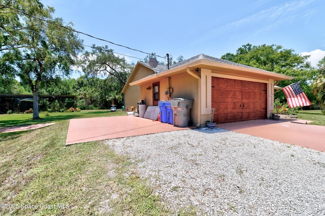 5505 95th St, Sebastian, FL 32958 - garage featuring gravel driveway