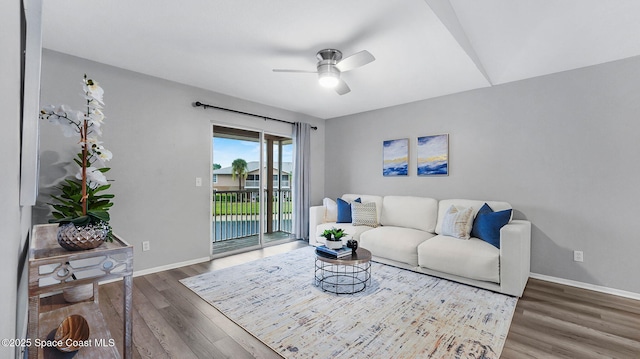1880 Long Iron Dr Unit 1322, Rockledge, FL 32955 - living area with wood finished floors and a ceiling fan