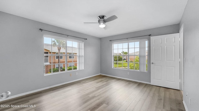 1880 Long Iron Dr Unit 1322, Rockledge, FL 32955 - empty room with wood finished floors and a ceiling fan
