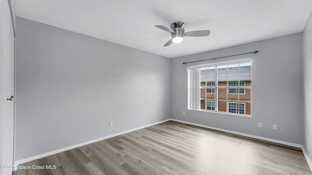 1880 Long Iron Dr Unit 1322, Rockledge, FL 32955 - spare room featuring wood finished floors and a ceiling fan