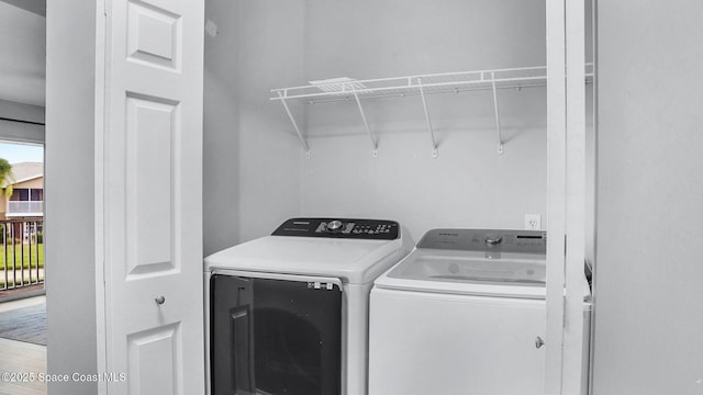 1880 Long Iron Dr Unit 1322, Rockledge, FL 32955 - washroom featuring separate washer and dryer