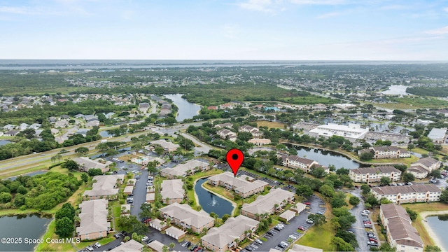 1880 Long Iron Dr Unit 1322, Rockledge, FL 32955 - view of property location with a large body of water and nearby suburban area